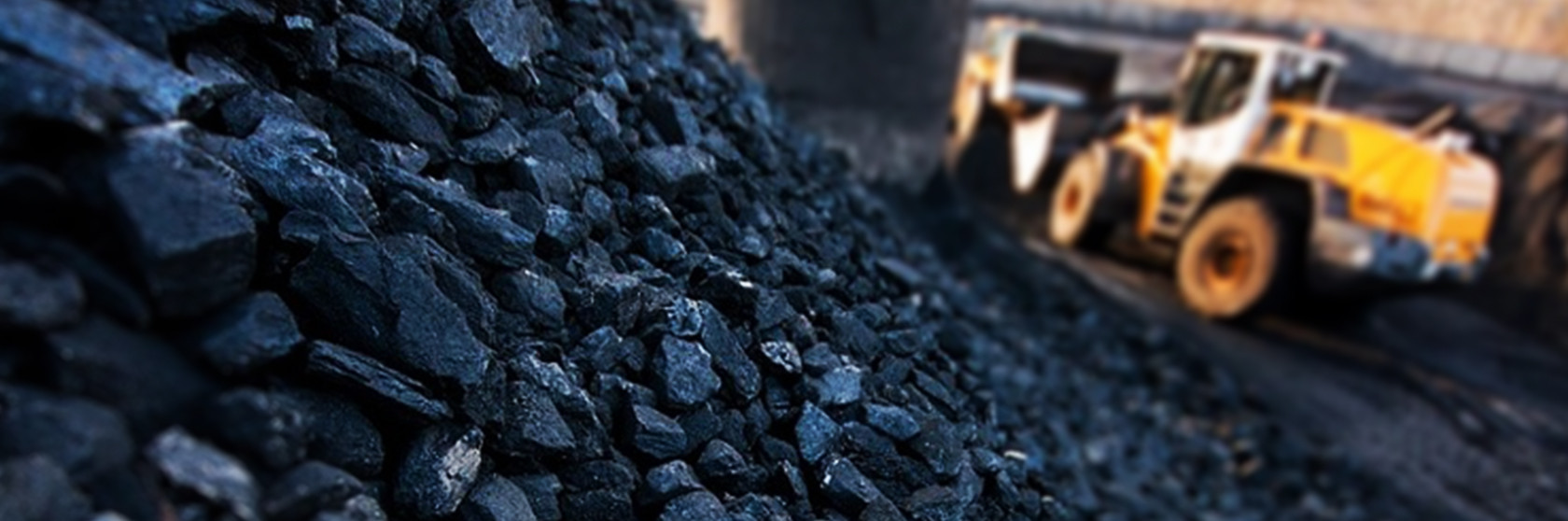 Heap of coal and a grader.jpg